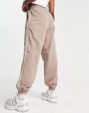 Adidas - Joggers in Chalky Brown