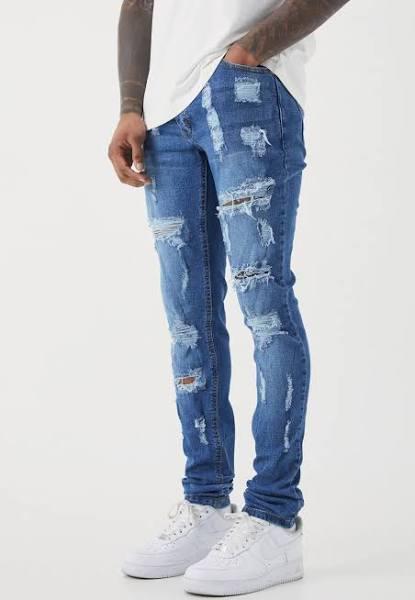 Mens Light Blue Skinny Stretch All Over Rip Stacked Jeans