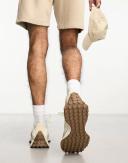 New Balance 327 Sneakers in Off White & Brown
