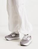 New Balance 574+ Sneakers in Dark Grey