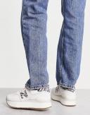 New Balance 574+ Sneakers in Off White Zebra