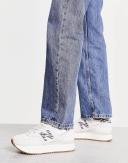New Balance 574+ Sneakers in Off White Zebra