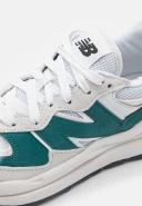 New Balance 5740 Sneakers in Off White and Green
