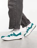 New Balance 5740 Sneakers in Off White and Green