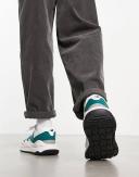 New Balance 5740 Sneakers in Off White and Green