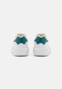 New Balance CT302 Sneakers in White with Green Detail