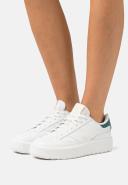 New Balance CT302 Sneakers in White with Green Detail