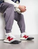 New Balance XC72 Sneakers in Grey and Red