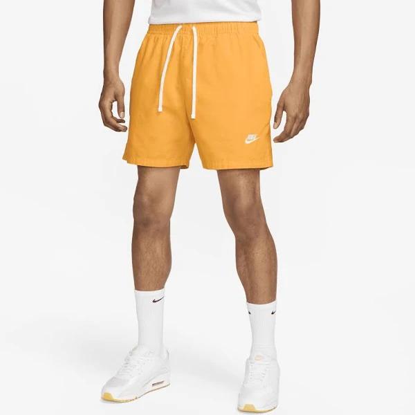 Nike Club Men's Woven Washed Flow Shorts - Yellow - 50% Organic Cotton