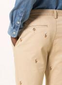 Polo Ralph Lauren All Over Pony Logo Slim Fit Chinos in beige-Neutral