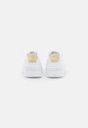 Puma Mayze Stack Sneakers in White and Gold