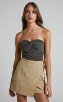 Showpo | Chevy Wrap Mini Skirt in Beige