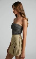 Showpo | Chevy Wrap Mini Skirt in Beige