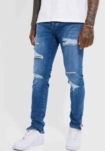 Skinny Stretch Ripped Jeans with Zip Hem