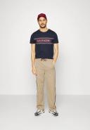 Tommy Hilfiger Chest Corp Stripe Logo T-Shirt in Navy