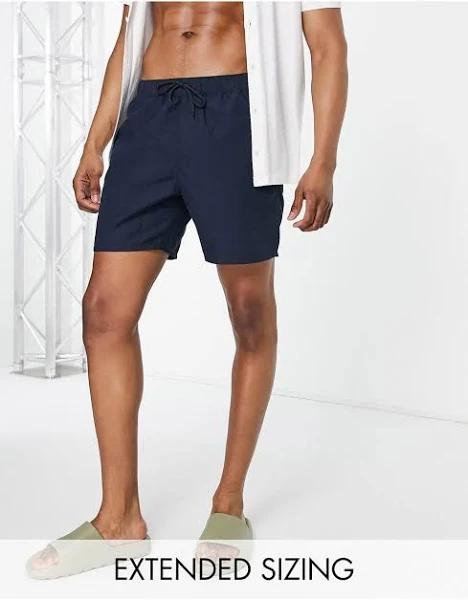 ASOS Design Swim Shorts in Mid Length in Navy