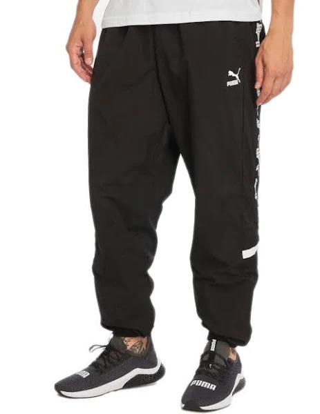 Men's Puma XTG Woven Pants in Black