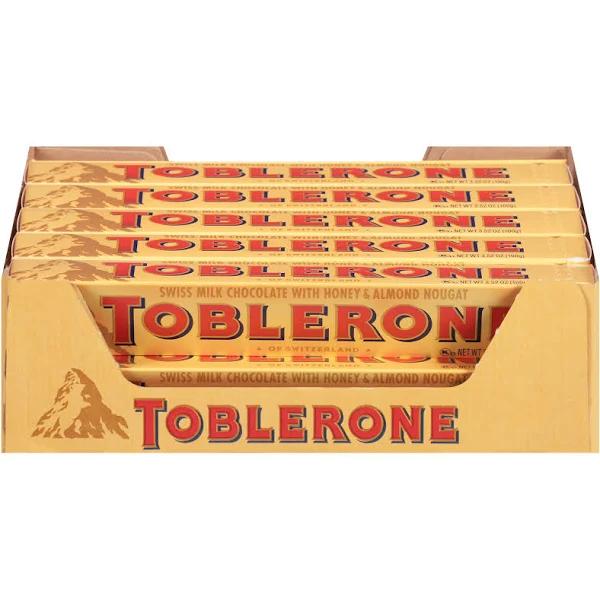 Toblerone Swiss Milk Chocolate with Honey & almond Nougat, Holiday Chr