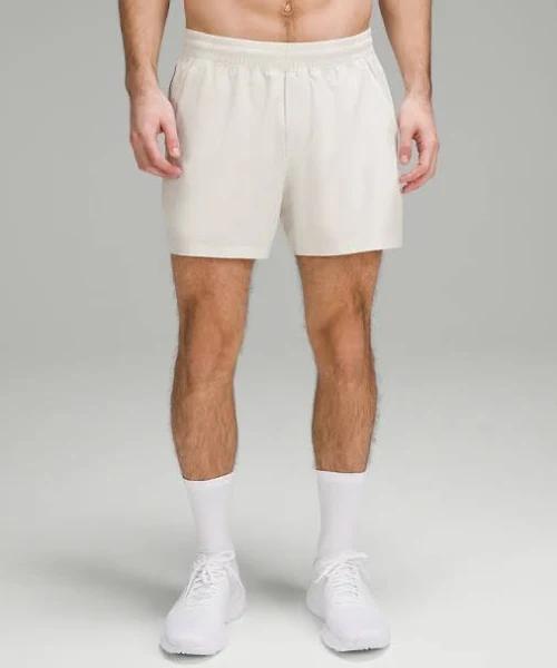 Men's Pace Breaker Linerless Shorts 5" in Bone Size XL | by lululemon