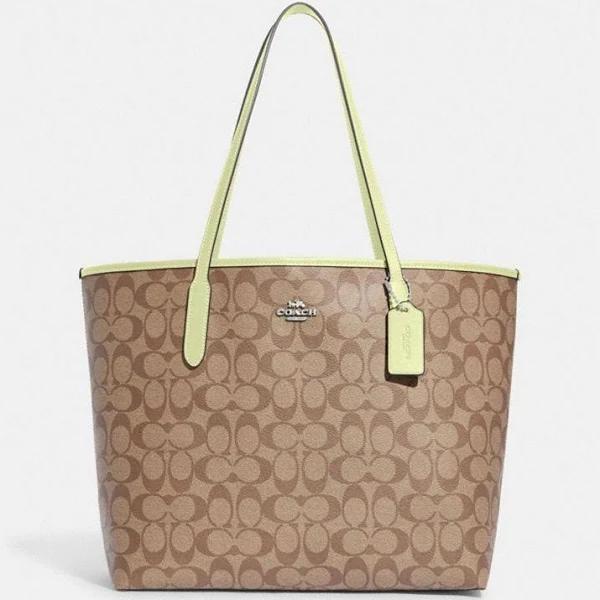 Coach Outlet City Tote in Signature Canvas - Women's Purses - Beige