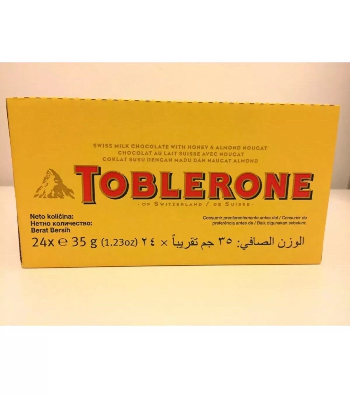 Toblerone Swiss Milk Chocolate with Honey & almond Nougat, Holiday Chr
